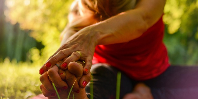 A calm woman sitting in a peaceful setting, visually representing the connection between nutrition and mental health.