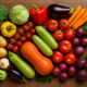 Diverse colorful vegetables on a wooden table